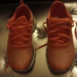 Womans size 6 orange and silver memory foam Skechers